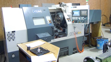 CNC turning machines YCM GT250MA. The maximum diameter – 270 mm. Mechanical treatment length – 560 mm. Rod diameter 52 mm.